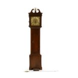 An oak longcase clock by R. Norman, Poole,