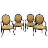 A set of four George III style mahogany open armchairs,