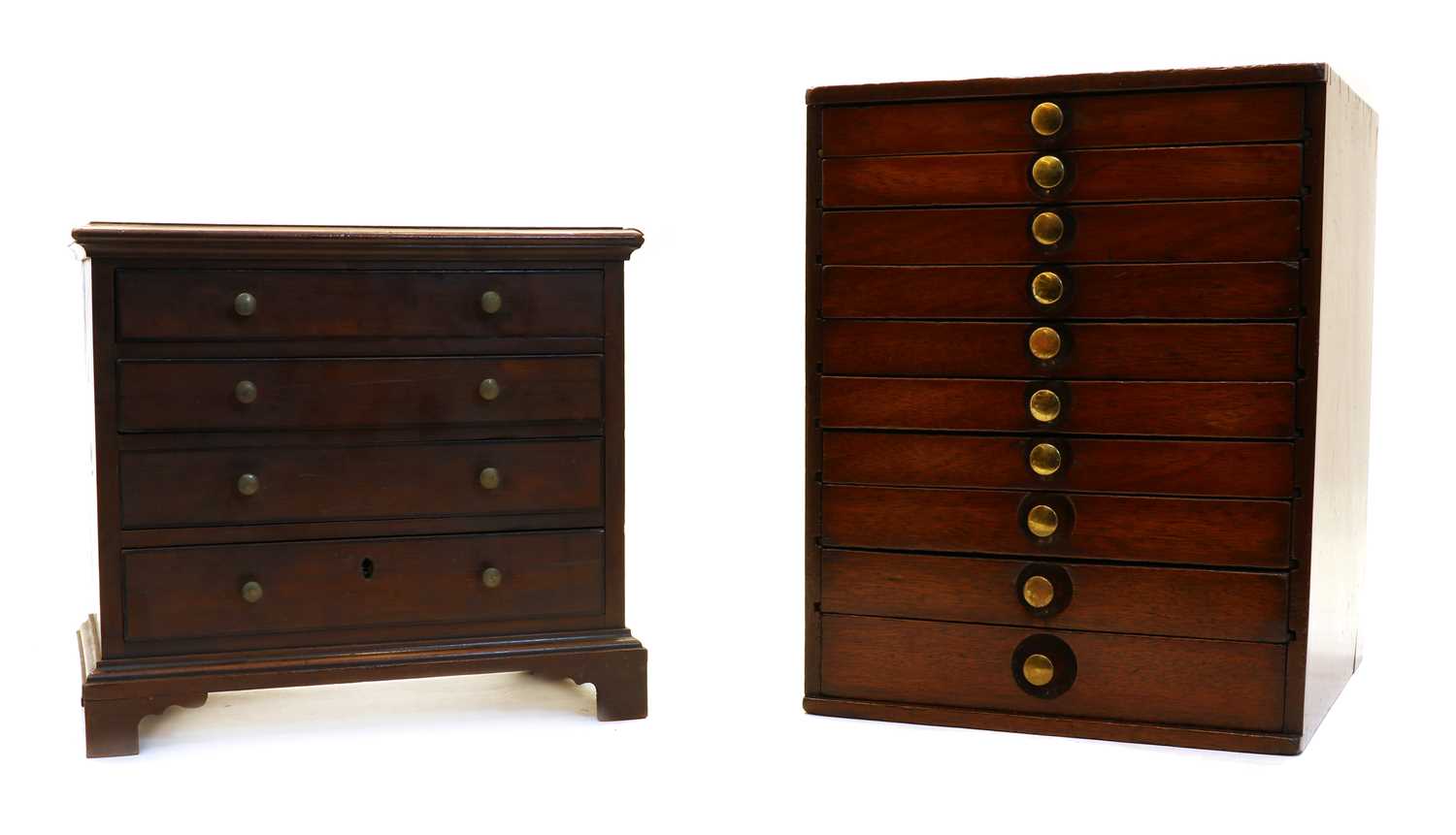 A mahogany table top collector's cabinet of 10 drawers,