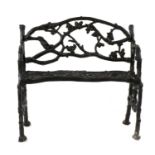 A Coalbrookdale style cast iron garden seat,