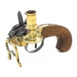 A reproduction brass framed flintlock tinder-box,