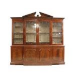 A George III style mahogany breakfront bookcase,