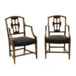 A pair of Gustavian style mahogany dining armchairs,