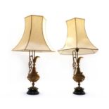 A pair of Continental gilt metal table lamps,