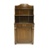 A Regency style grained rosewood bookcase cabinet,