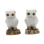 A pair of continental white porcelain owls,