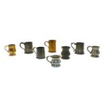 Over forty 19th and 20th century pewter pub measures
