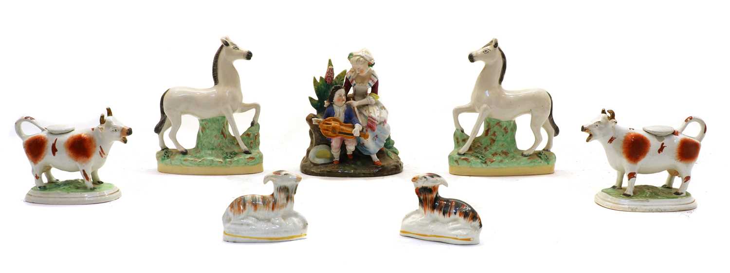 Ceramics, comprising: a pair of white Staffordshire horses,