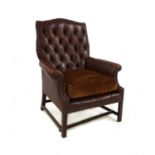 A George III mahogany framed library armchair,