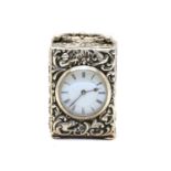 A late Victorian silver miniature carriage clock,