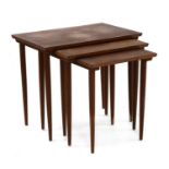 A nest of three teak tables,