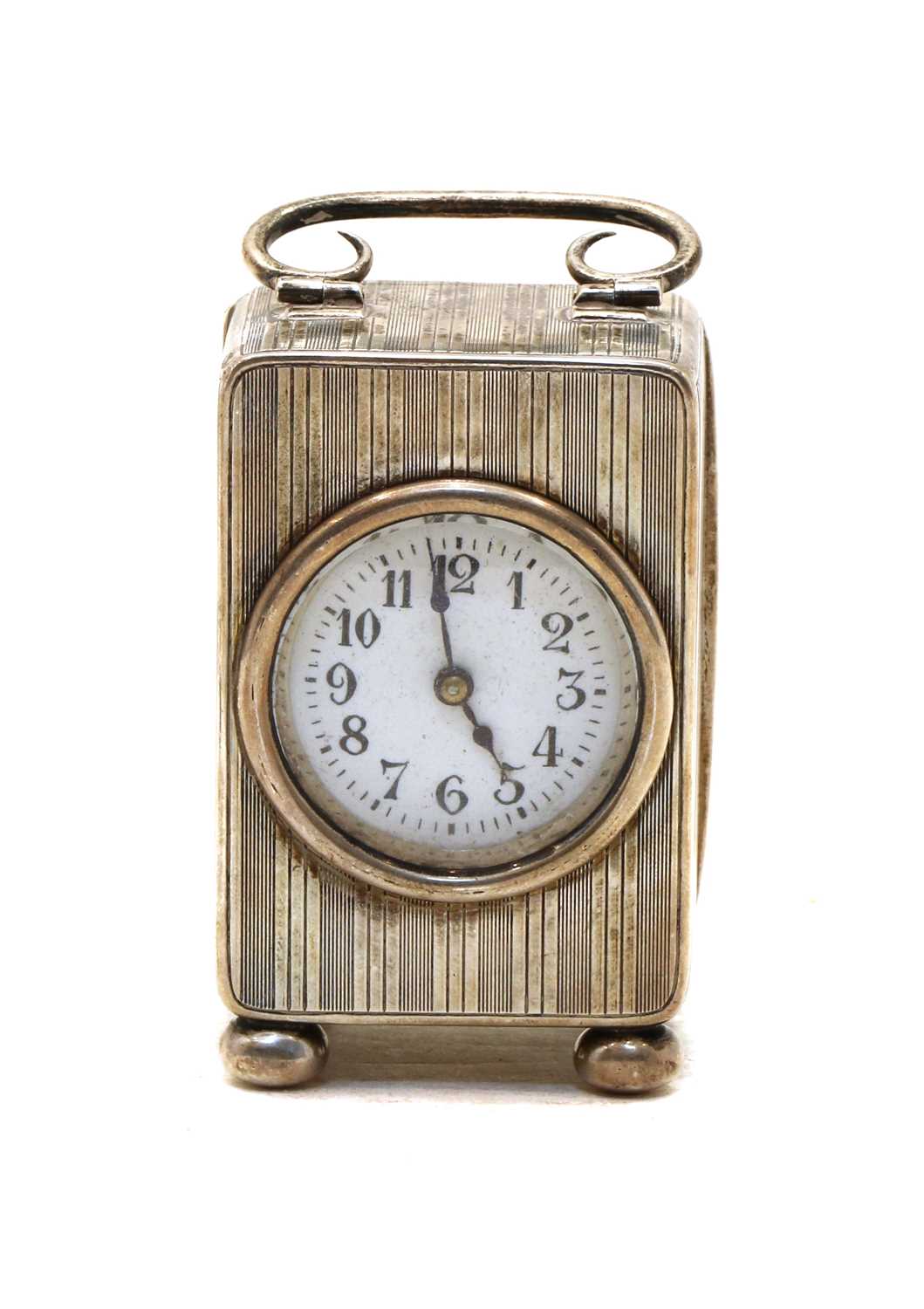 A silver miniature carriage clock,