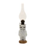 A late 19th/early 20th century continental white porcelain owl oil lamp,