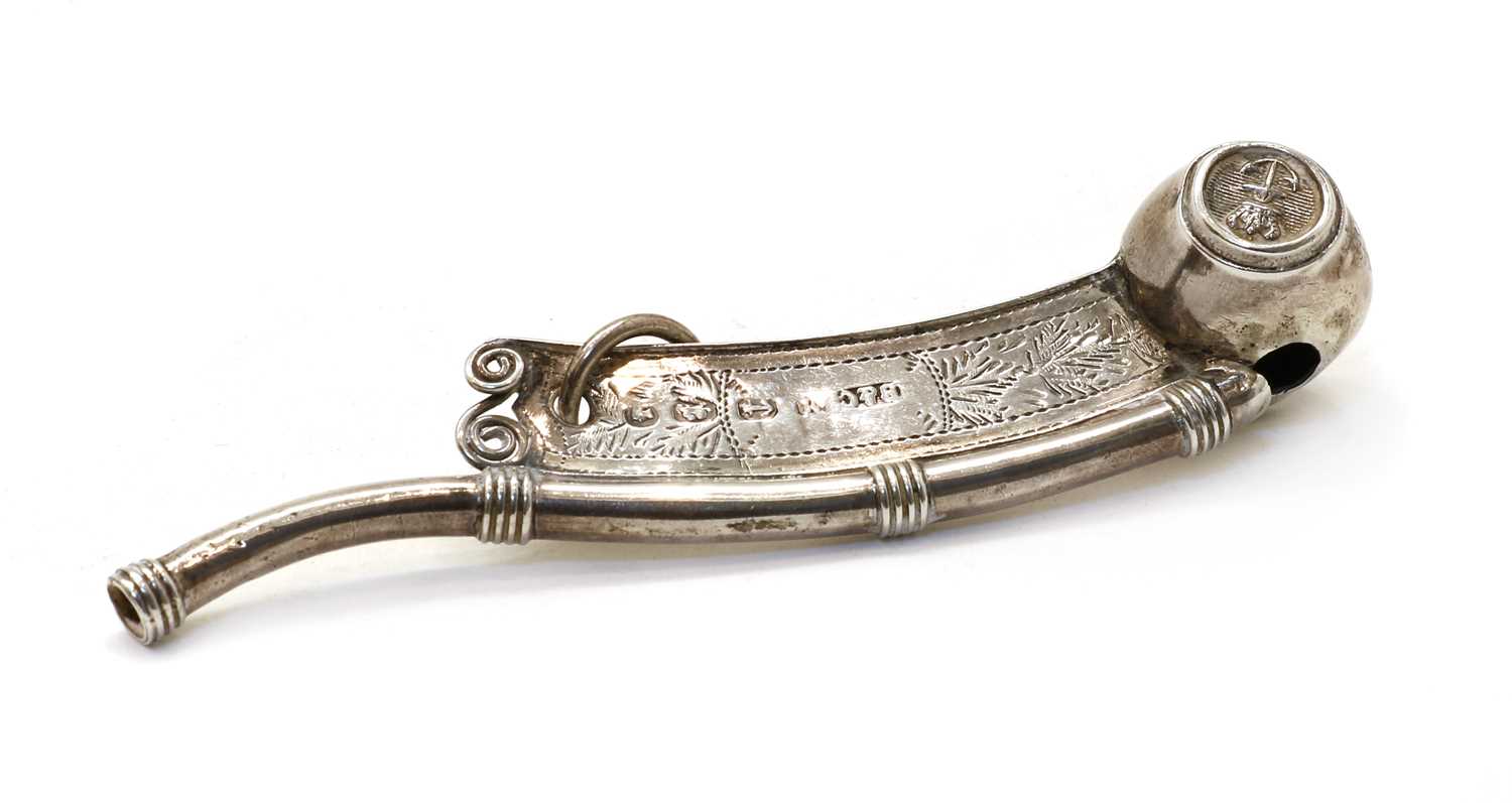 A Bosun's silver whistle,