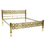 An Italian brutalist brass bed frame,