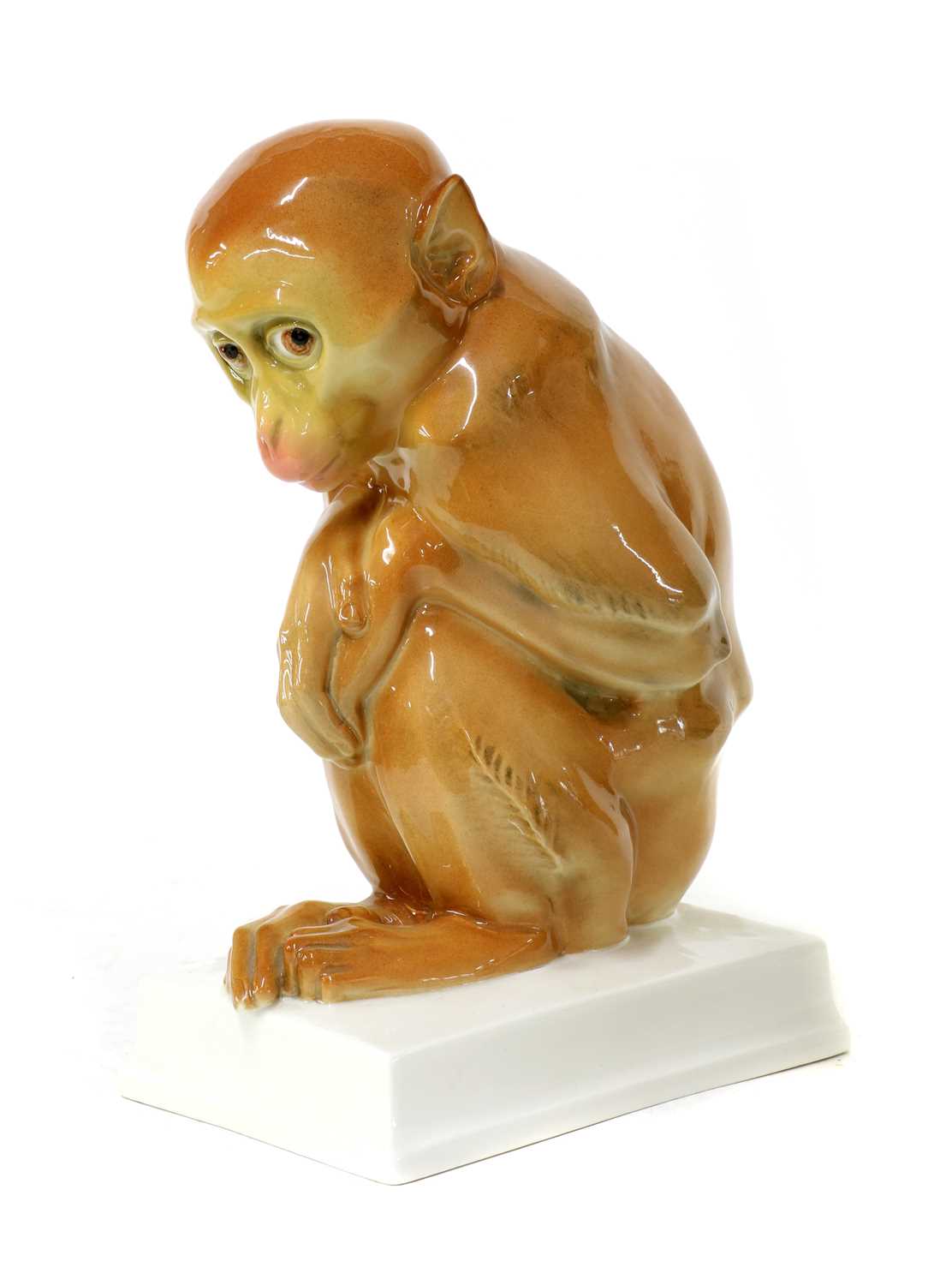 A porcelain figure of a monkey,