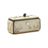 A Japanese carved ivory and silver mounted box,