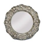 An Edwardian circular silver easel backed dressing table mirror,