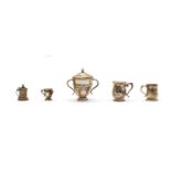 A collection of miniature silver items,