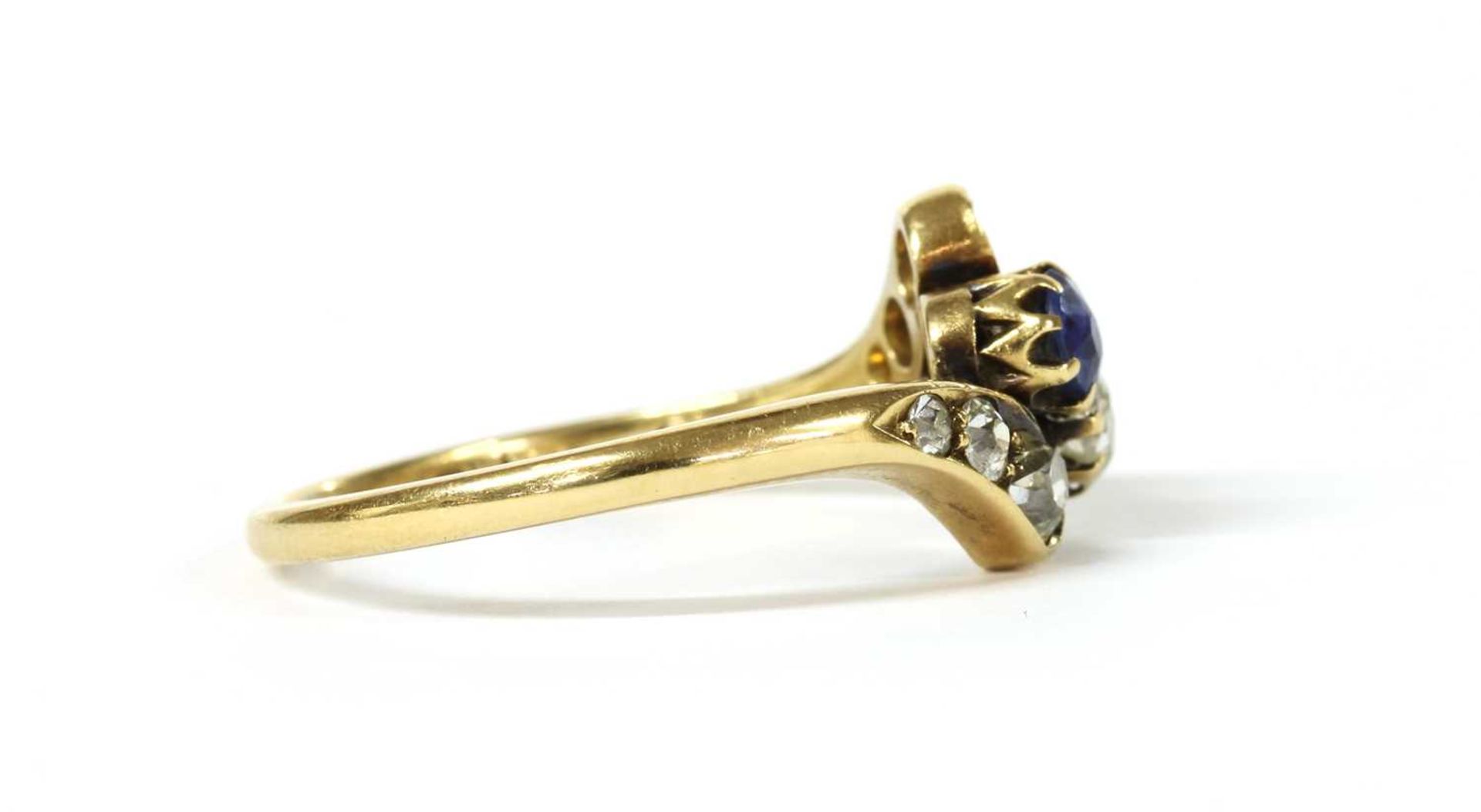 An Edwardian gold sapphire and diamond crossover ring, - Image 2 of 3