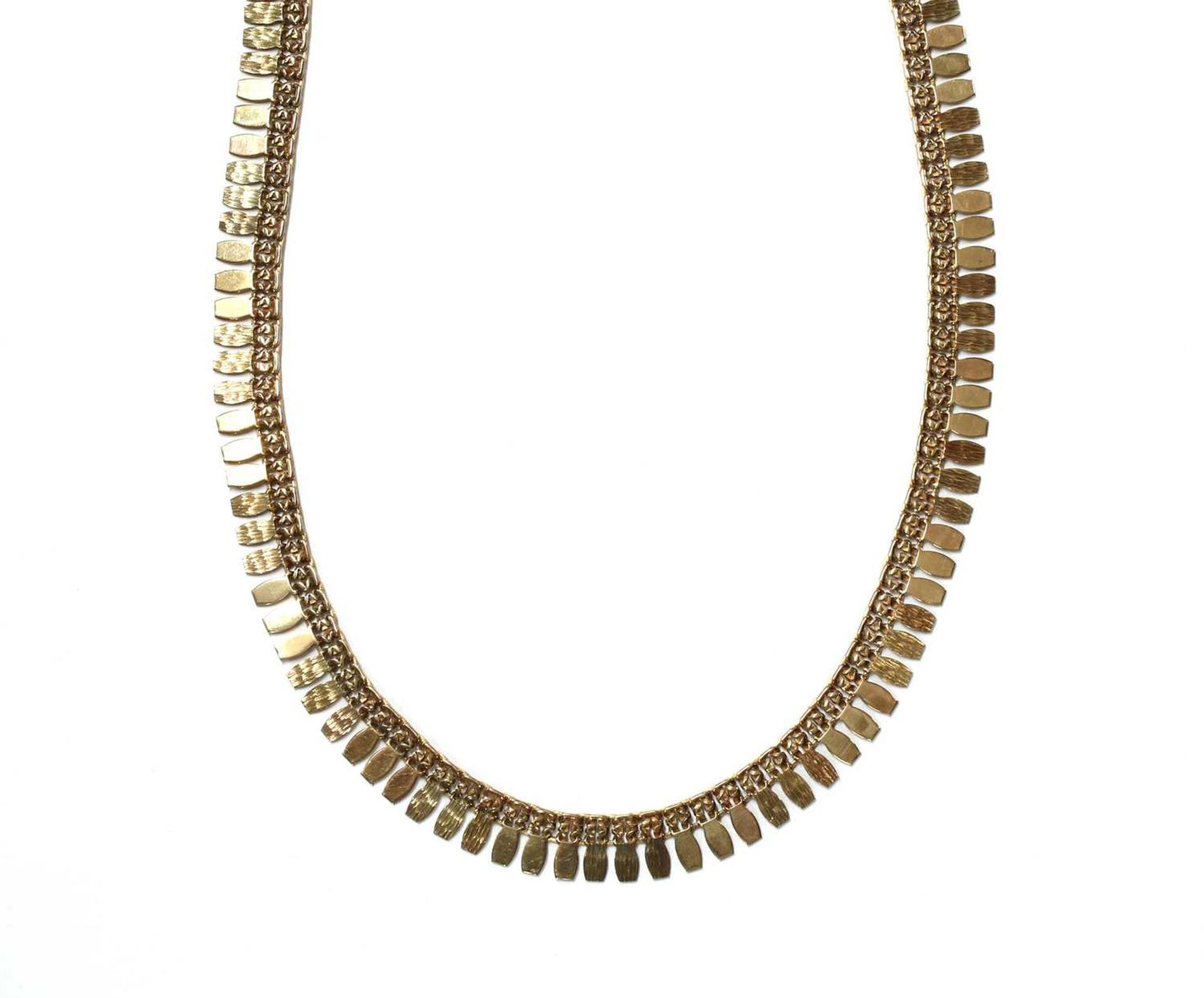 A gold fringe necklace,