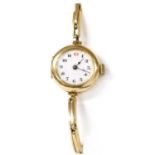 A ladies' 15ct gold mechanical bracelet watch,