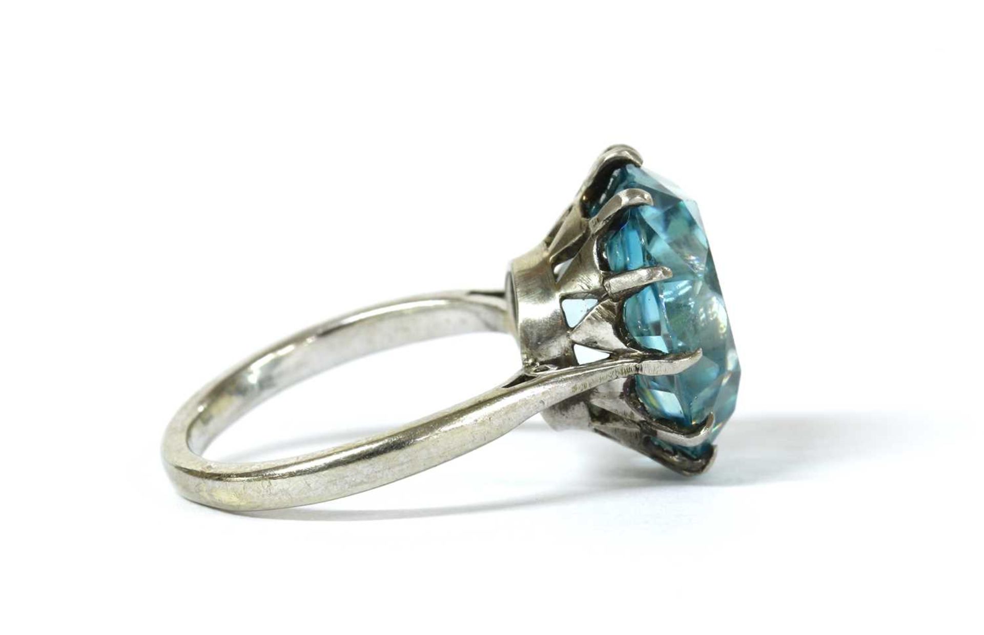 A white gold single stone blue zircon ring, - Image 2 of 3