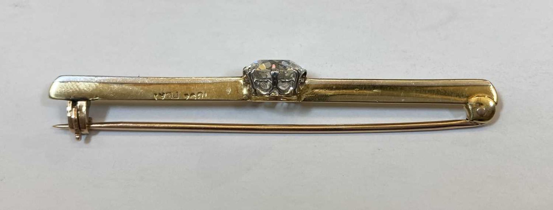 A gold and platinum single stone diamond bar brooch, - Image 3 of 5