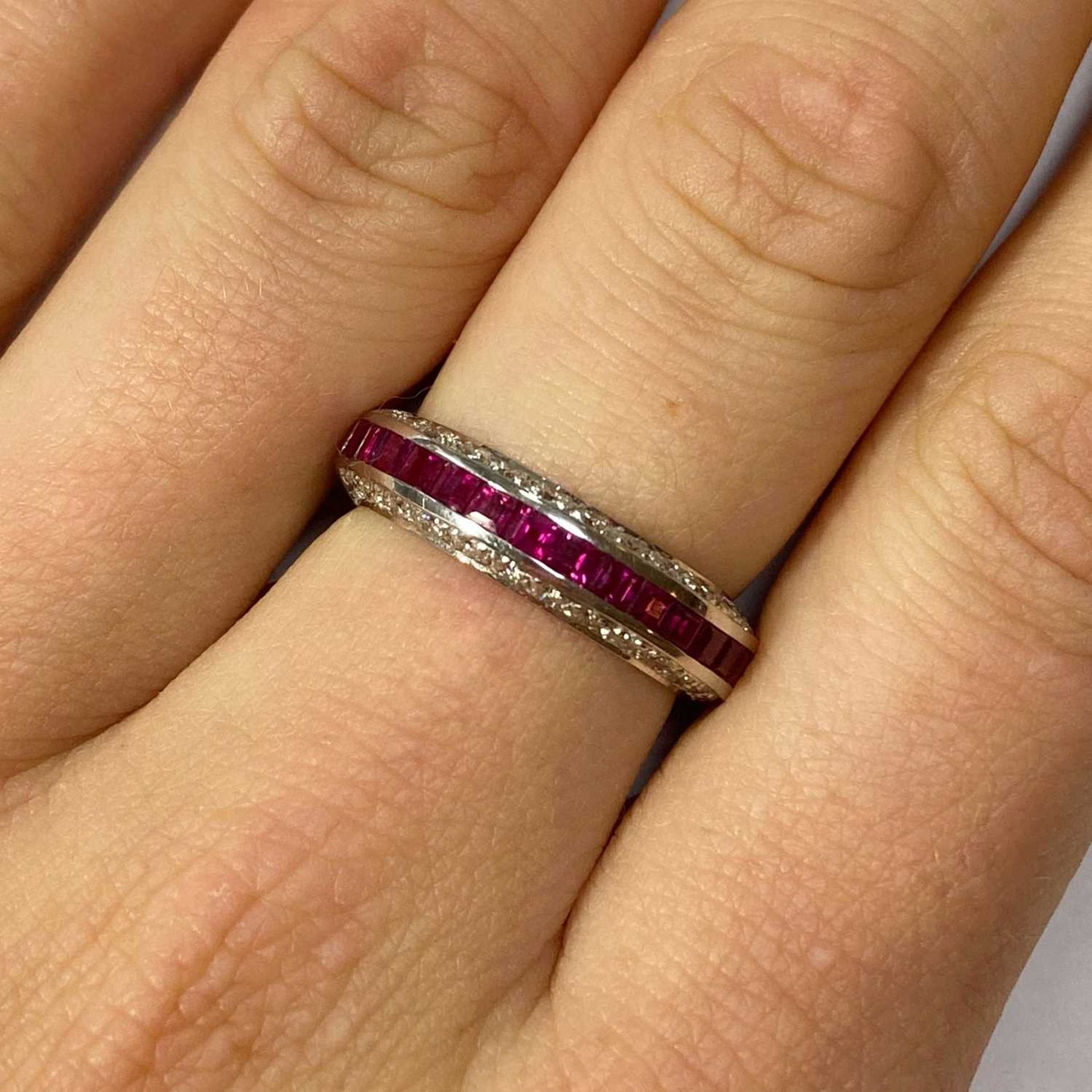 A white gold ruby and diamond half eternity ring, - Image 4 of 4