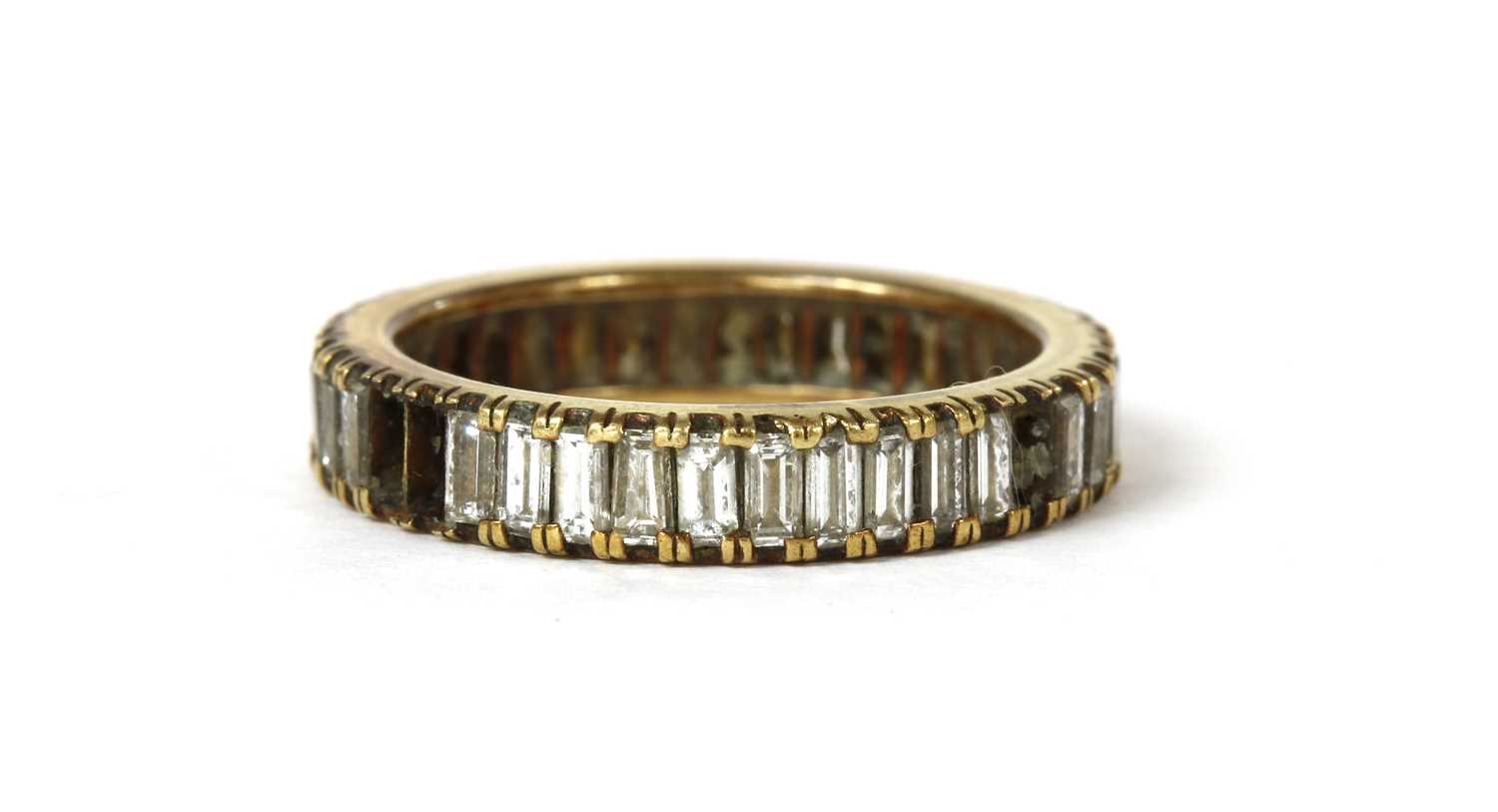 A gold diamond set full eternity ring,