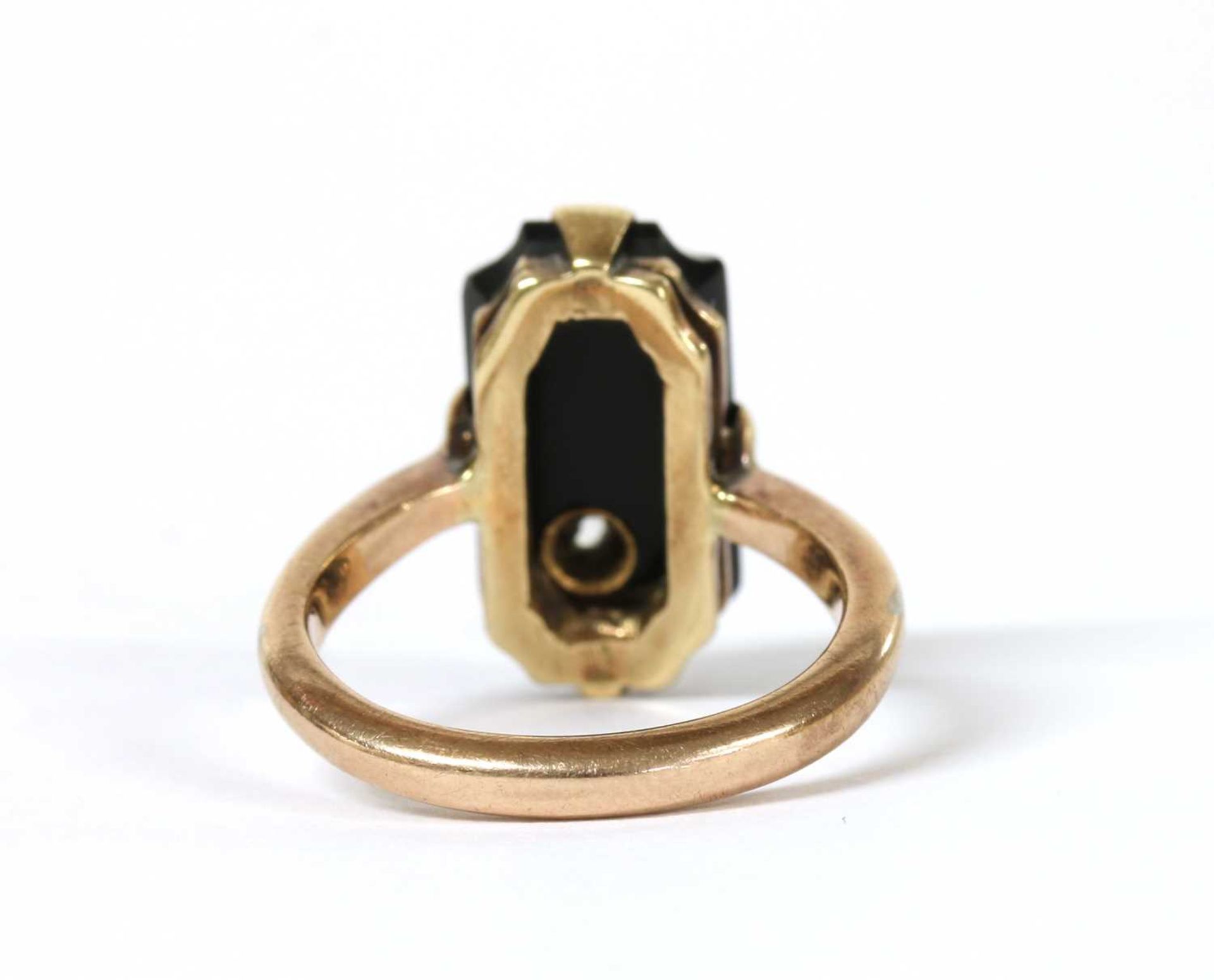 A gold diamond and onyx ring, - Image 3 of 3
