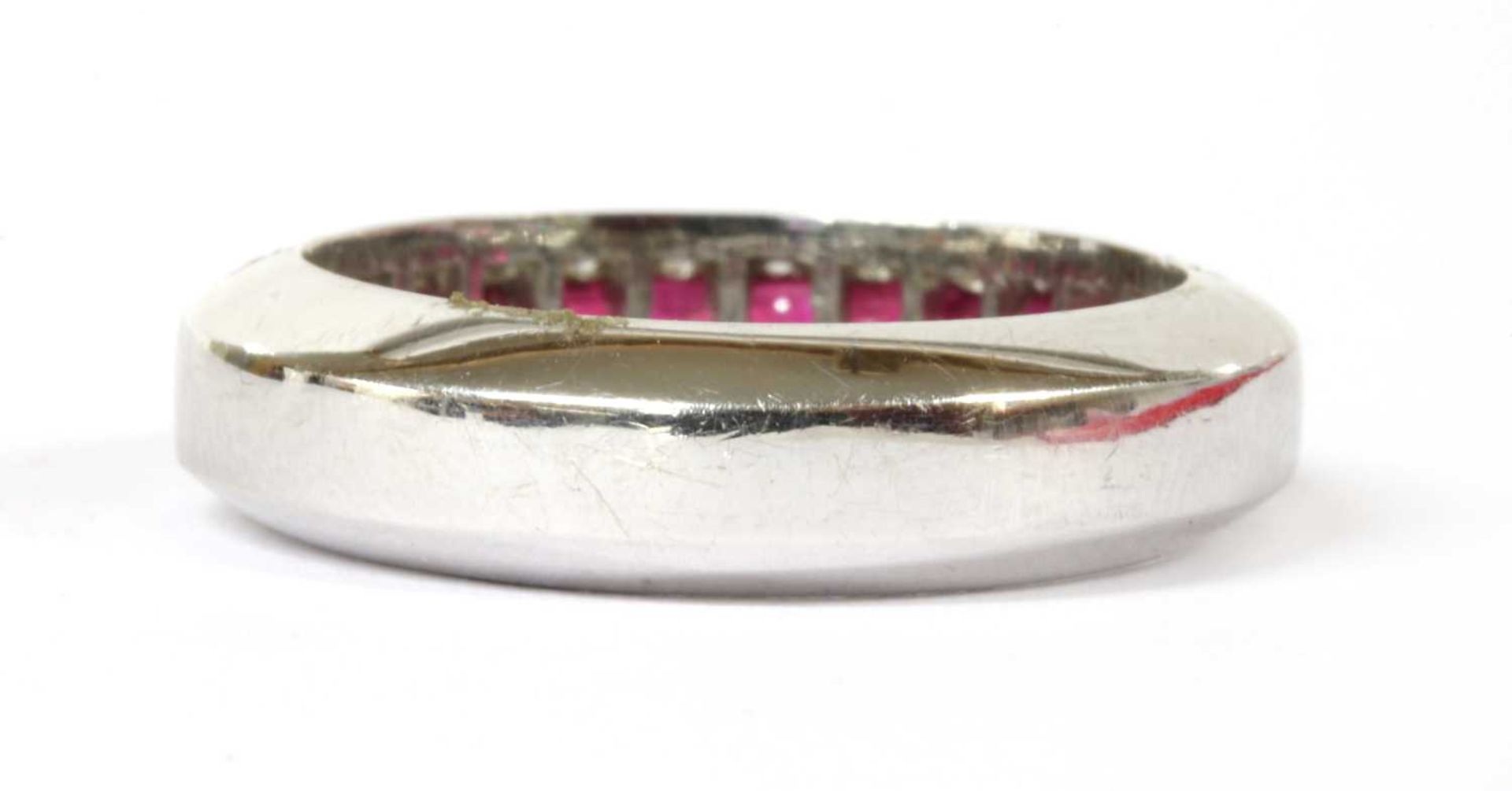 A white gold ruby and diamond half eternity ring, - Image 3 of 4