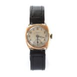 A mid-size 9ct gold mechanical strap watch,