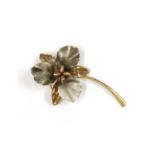 A 9ct yellow and white gold flower brooch, by Ecco,