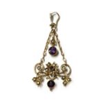 An Edwardian gold amethyst and split pearl pendant,