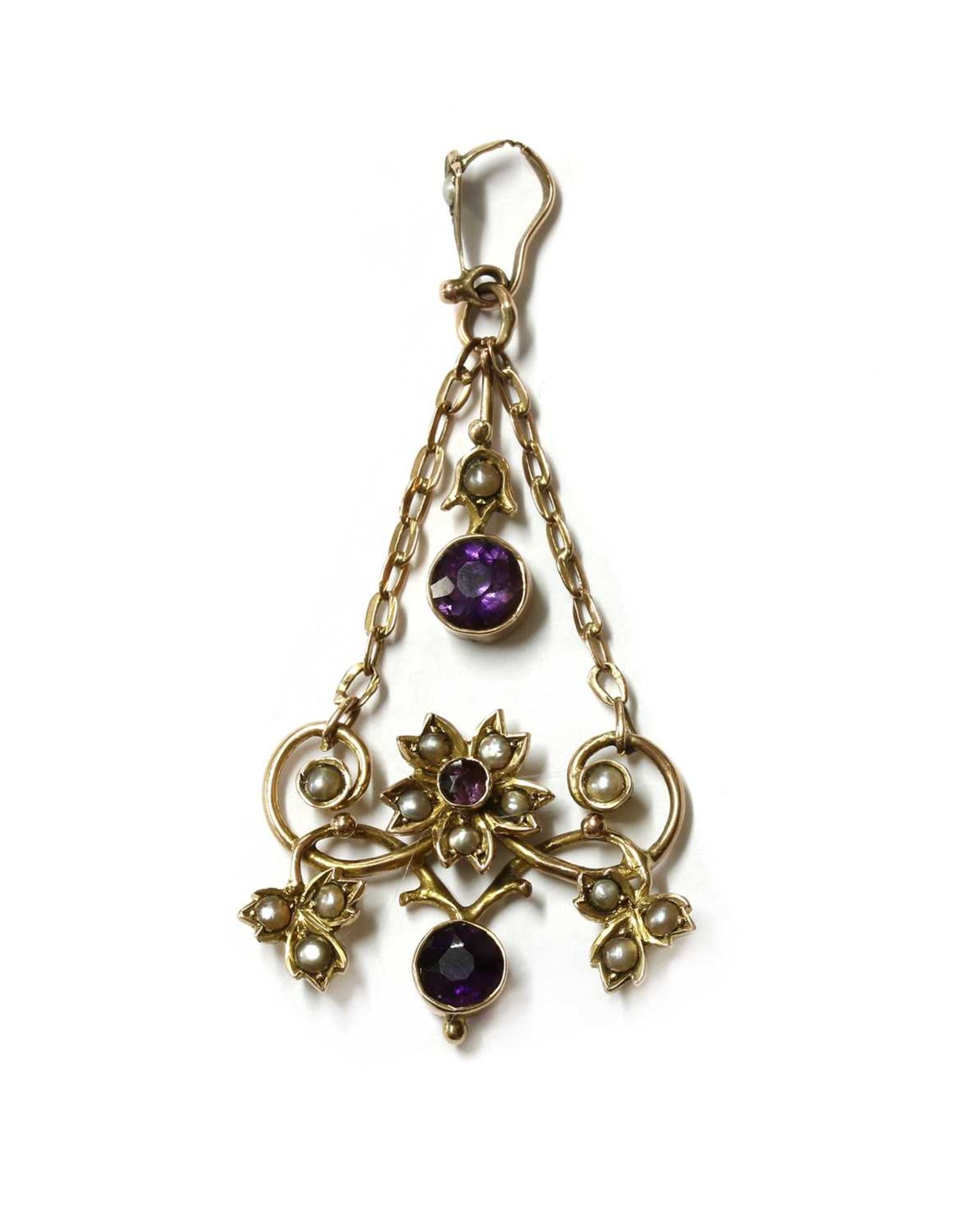 An Edwardian gold amethyst and split pearl pendant,