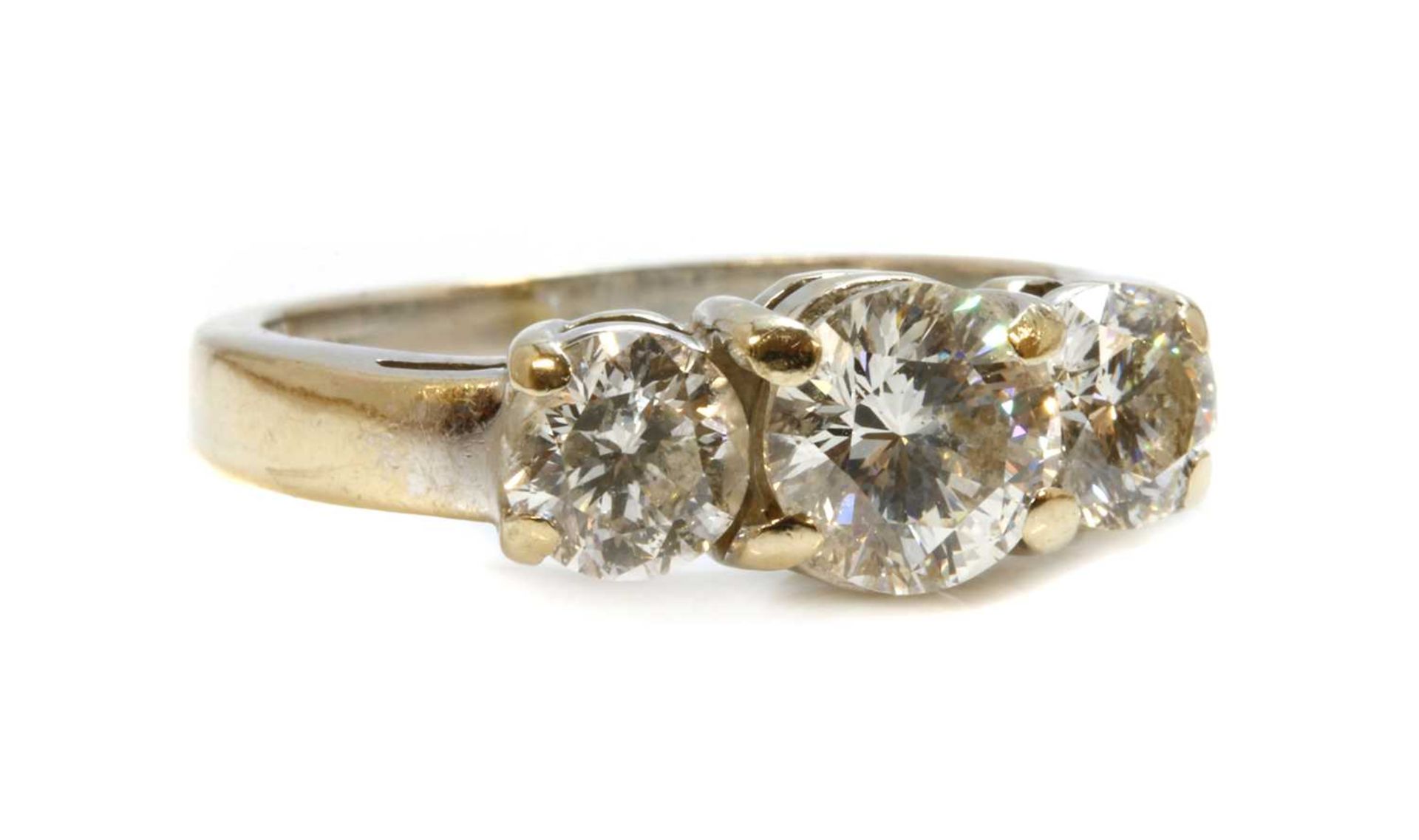 A white gold three stone diamond ring, - Image 2 of 3