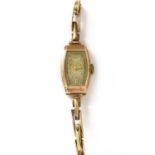 A ladies' 9ct gold mechanical bracelet watch,