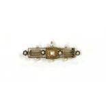 A gold Archaeological revival diamond and seed pearl brooch,