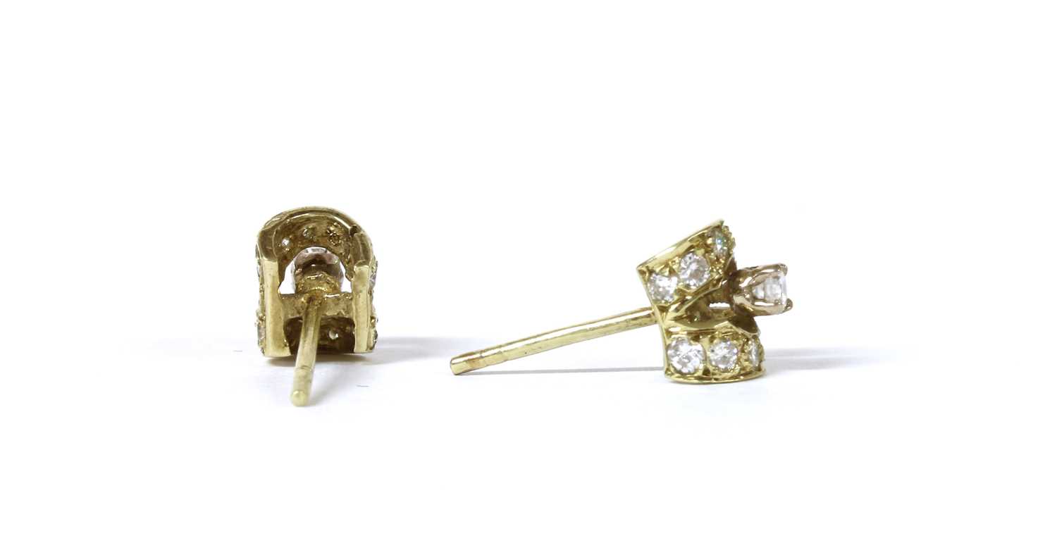 A pair of gold diamond stud earrings, - Image 2 of 2