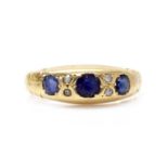 An Edwardian 18ct gold sapphire and diamond ring,