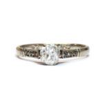 A white gold single stone diamond ring,