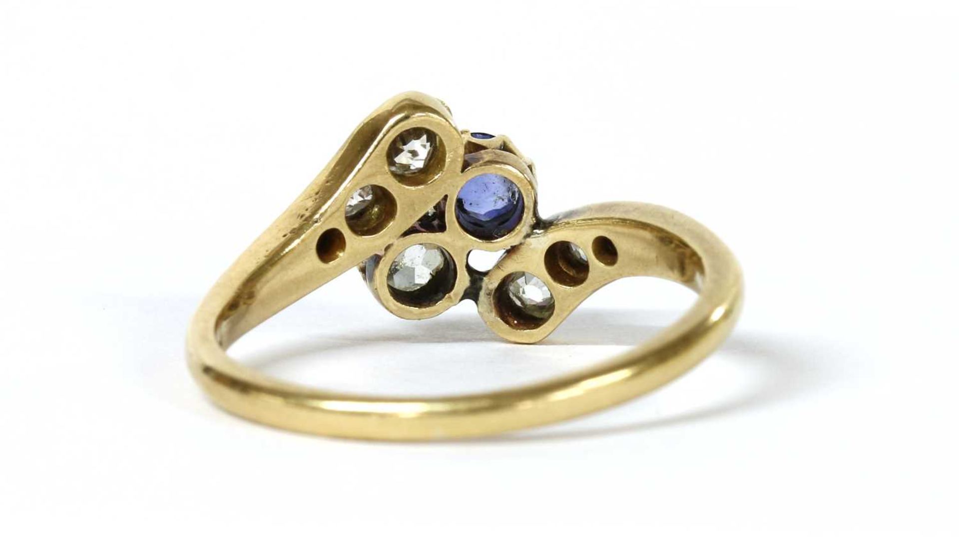 An Edwardian gold sapphire and diamond crossover ring, - Image 3 of 3