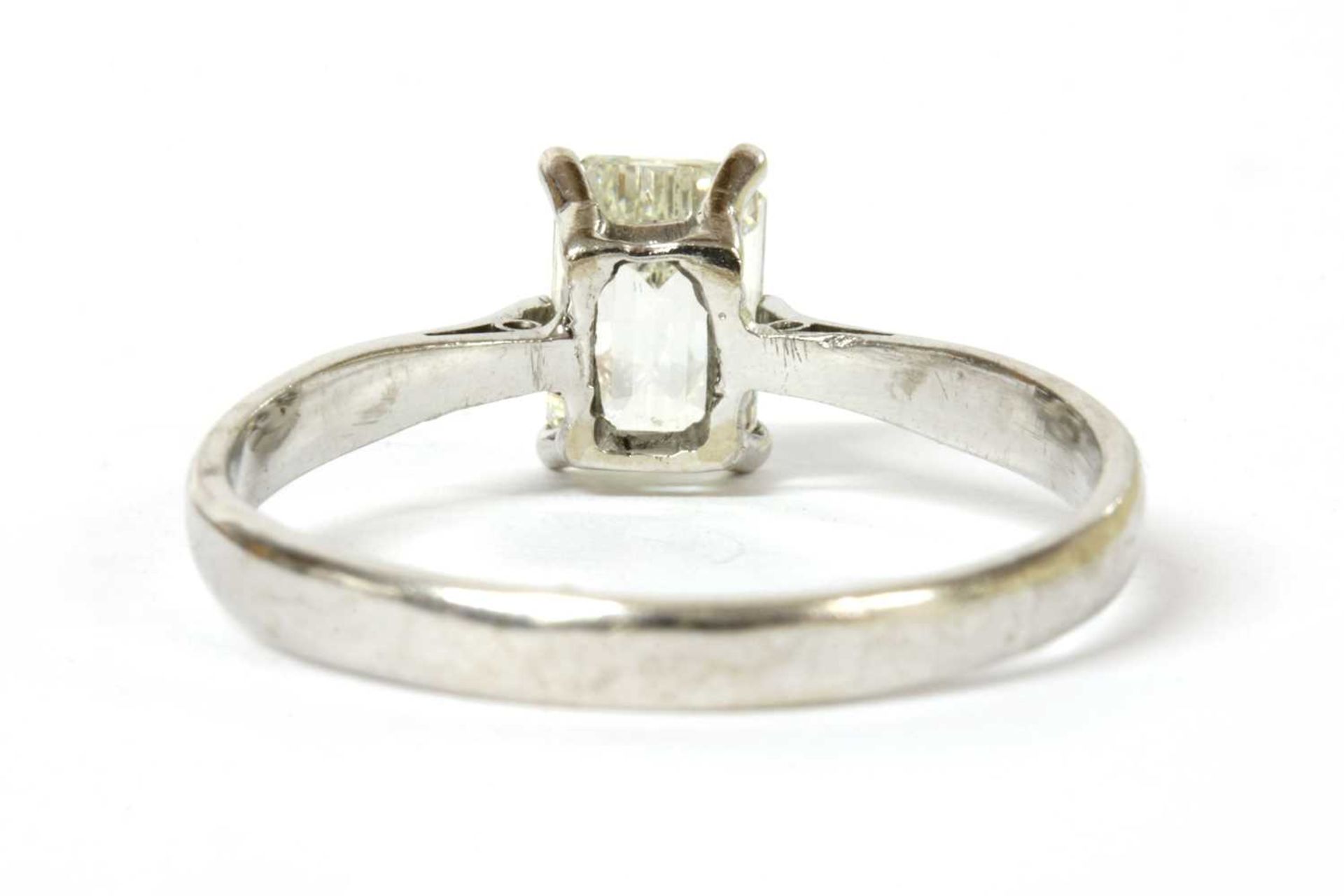 An 18ct white gold single stone emerald cut diamond ring, - Image 3 of 3