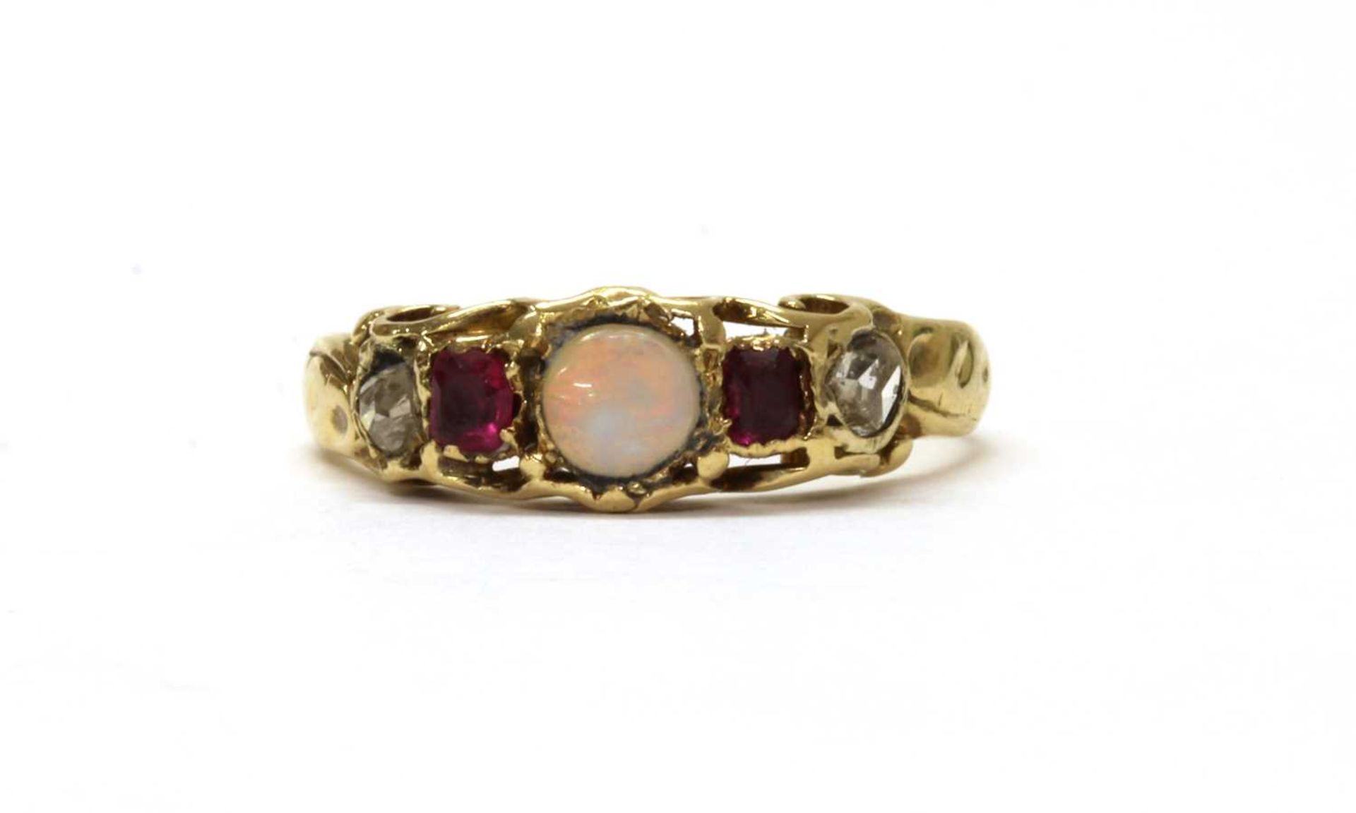 A gold opal, ruby and diamond ring,