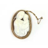 A gold mounted shell cameo brooch,
