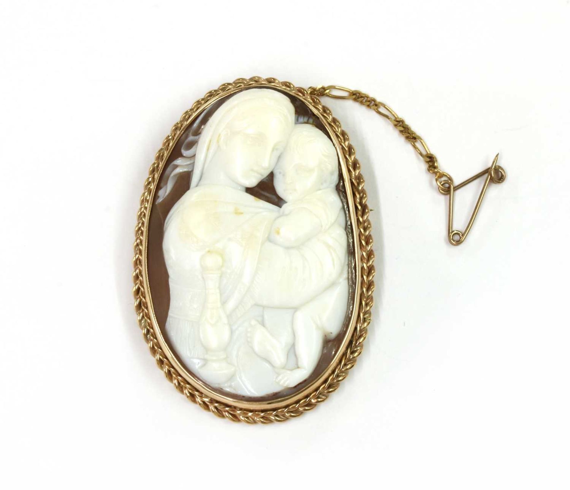 A gold mounted shell cameo brooch,