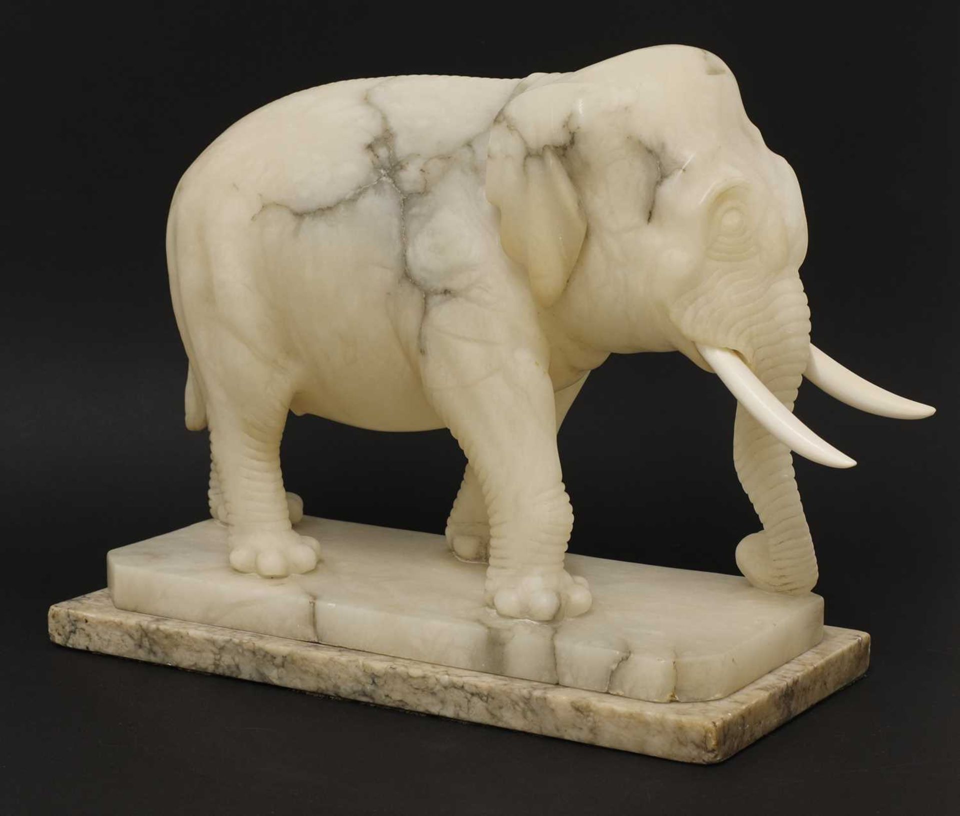 An Indian carved alabaster figure of an elephant, - Image 6 of 6
