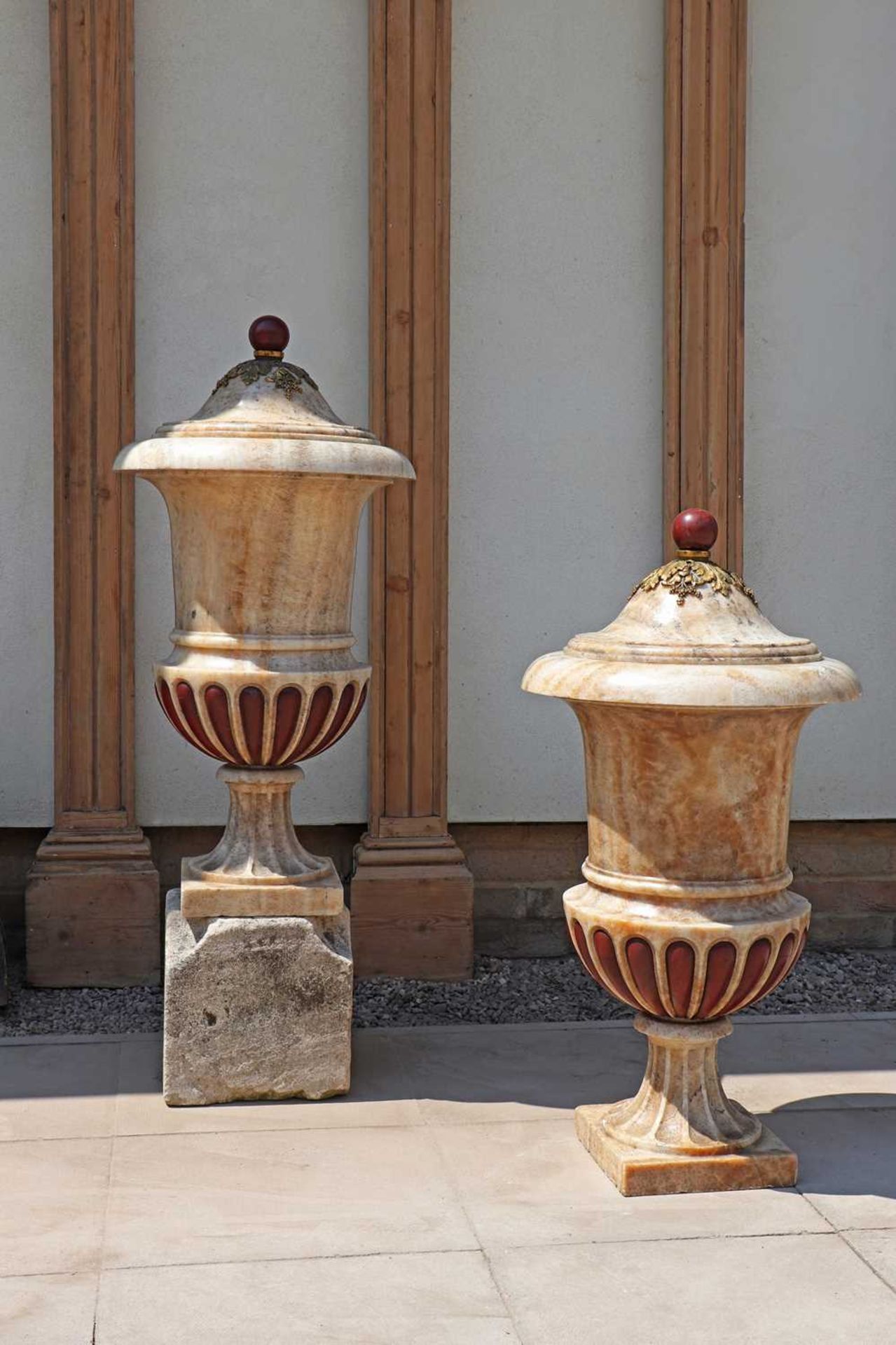 A pair of impressive alabaster Medici urns