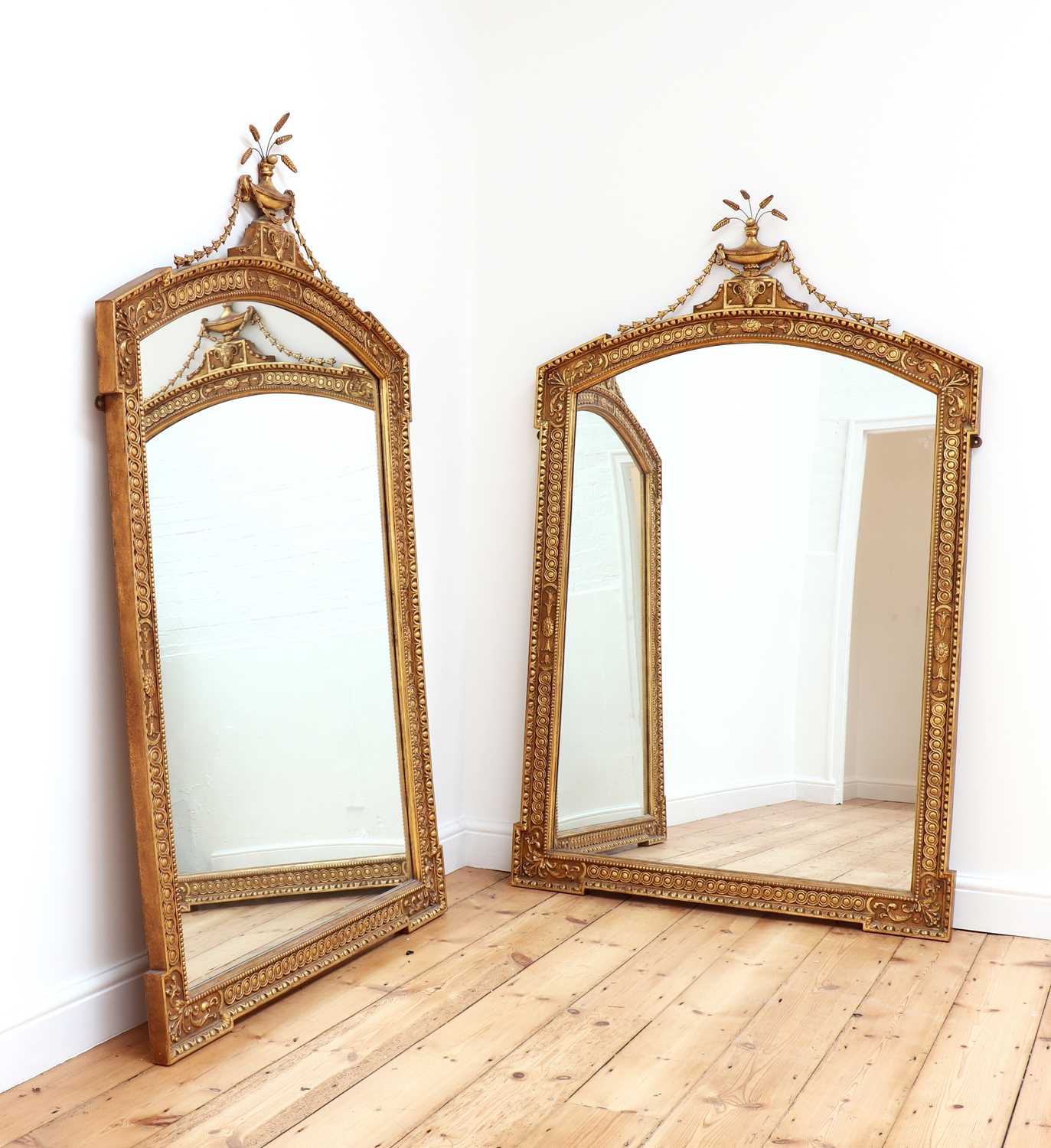 A pair of giltwood wall mirrors,